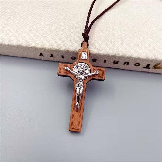 Elegant Handcrafted Wooden Cross Pendant Necklace with Intricate Carving and Twine Tassel